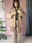 Cardigan fringe Dakota – Morbidezza e movimento in ogni passo